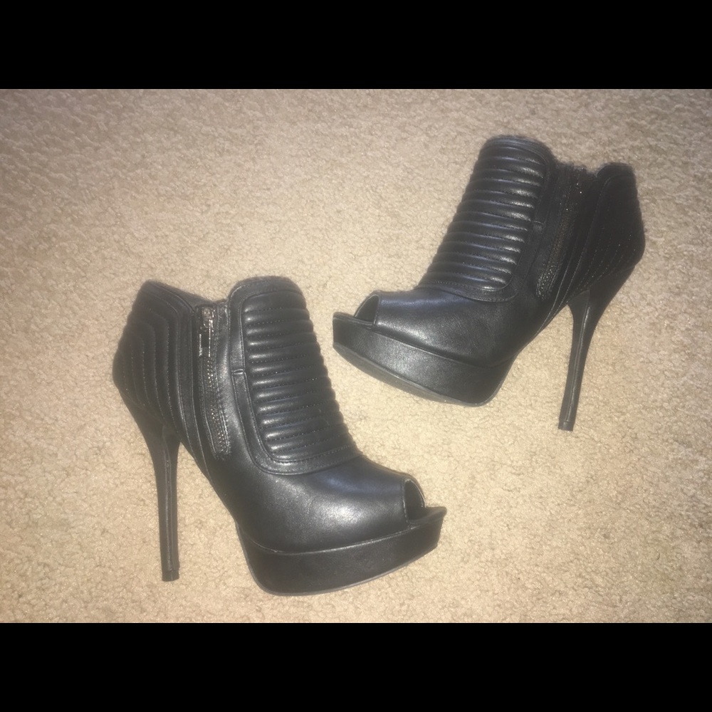 Black heels with zippers